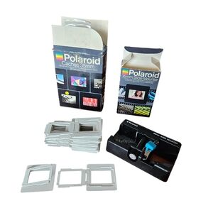 Polaroid 35mm slide mounter and 34 slide‎ mounts
